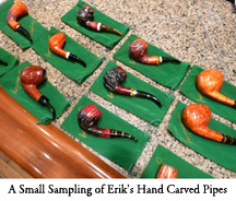 A Small Sampling of Erik's Hand Carved Pipes are Displayed at the Tobacco Bar
